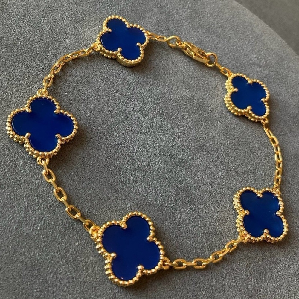 Elegant Gold and Blue Clover Bracelet